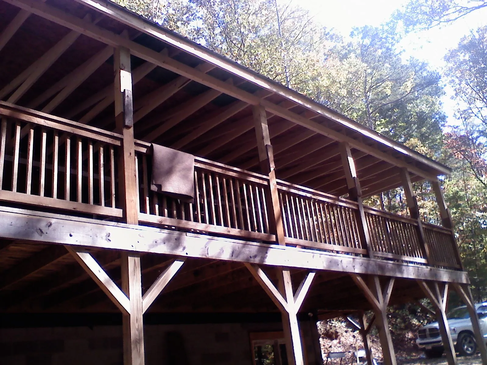Timber framing under a new elevated porch and deck — Roof Leak Repair in Brigham City by Roofing Brothers